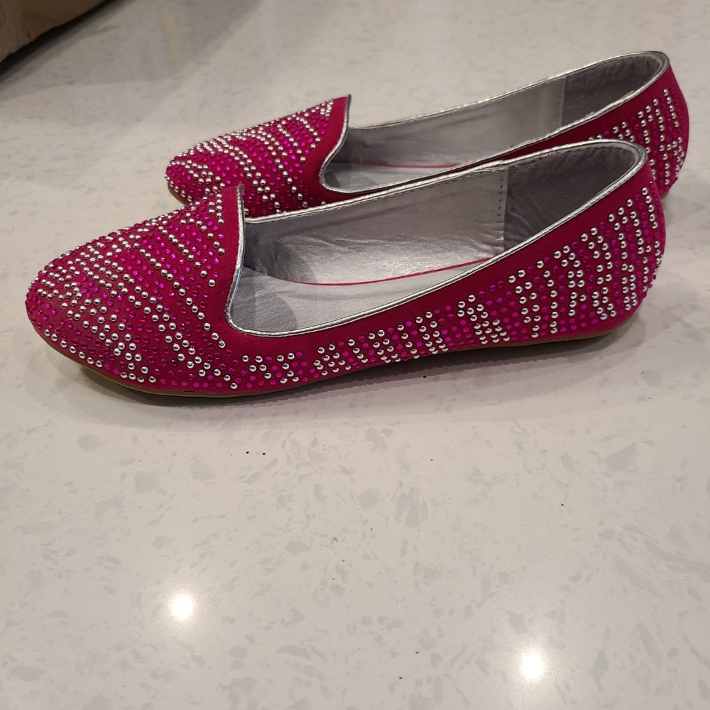 Pink jeweled flats